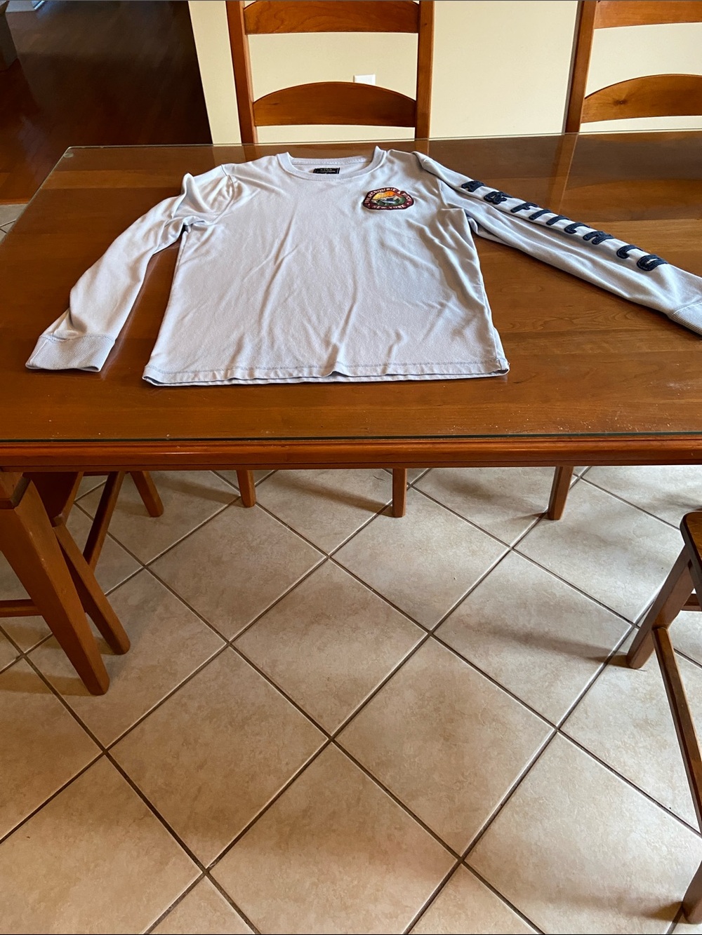 Abercrombie & Fitch Light Blue Cotton Top. Insignia on Chest and Sleeve. M